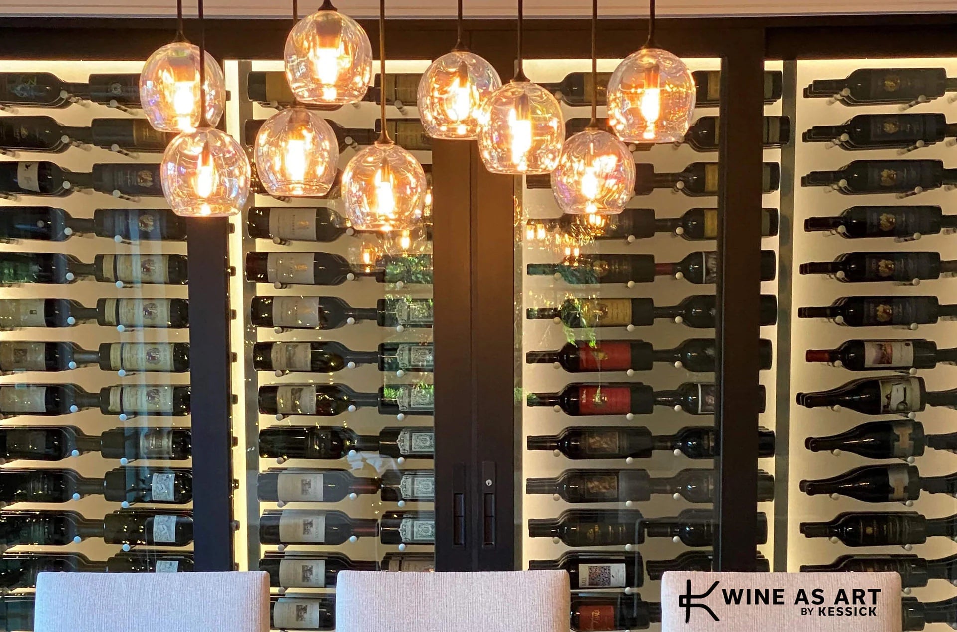 an image of a wine as art display showcasing beautiful bottles of wine in a luxury home